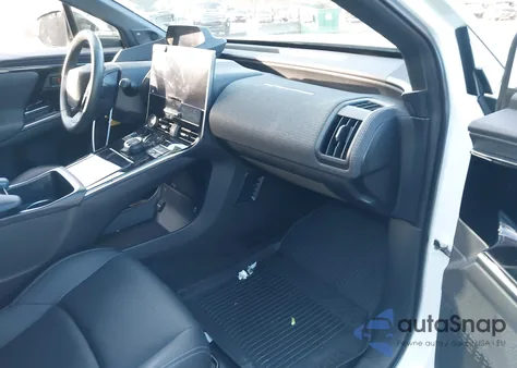 2023 Toyota Bz4X Limited z USA, uszkodzony, nr VIN JTMABACA0PA023842